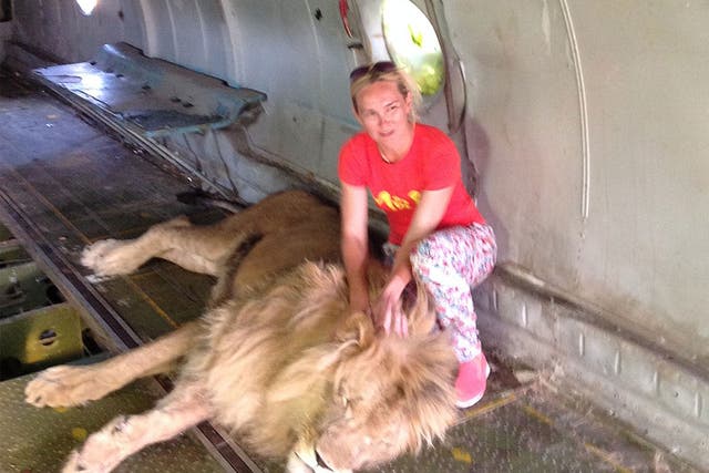 Olga Solomina posed with the lion moments before the attack took place