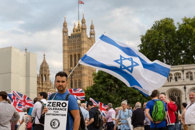 The campaign group, Campaign Against Antisemitism, Jewish community groups and their supporters stage a protest in Parliament Square, London, England on July 19, 2018