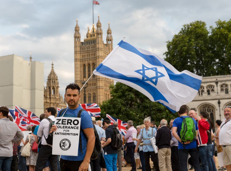 The campaign group, Campaign Against Antisemitism, Jewish community groups and their supporters stage a protest in Parliament Square, London, England on July 19, 2018