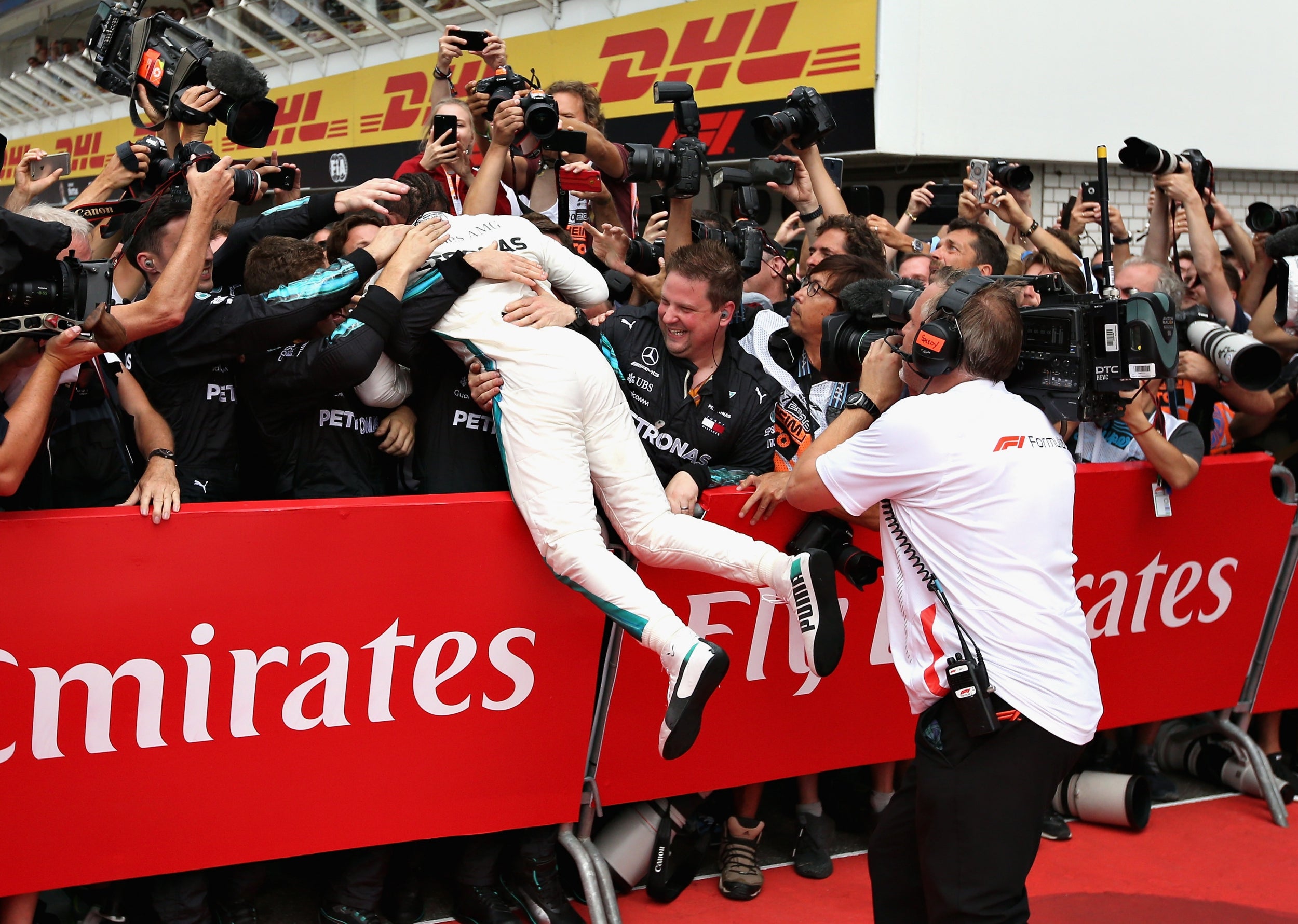 Hamilton pulled off a remarkable victory after fighting back from 14th on the grid