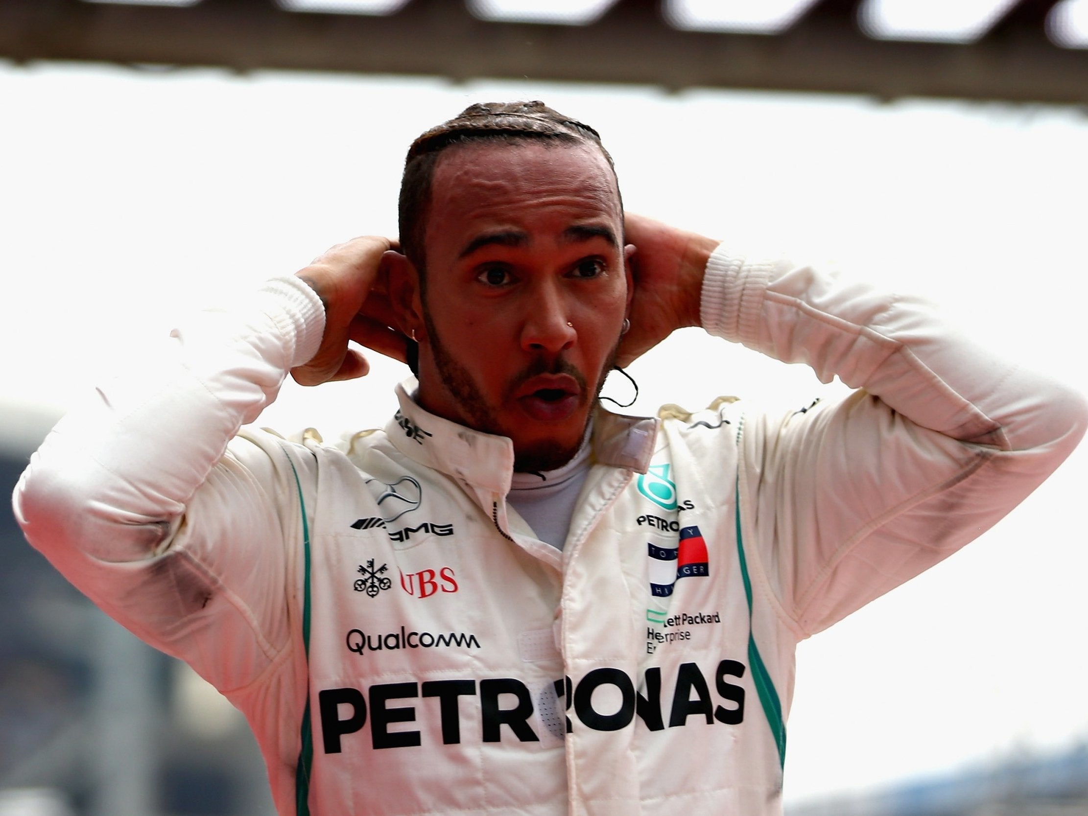 Lewis Hamilton celebrates his victory at the German GP