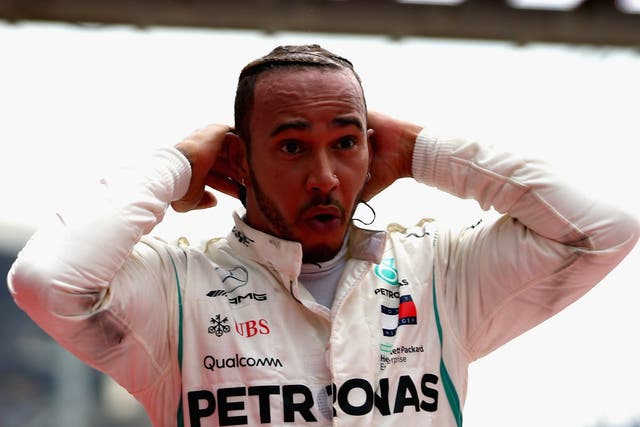 Race winner Lewis Hamilton of Great Britain and Mercedes GP celebrates in parc ferme