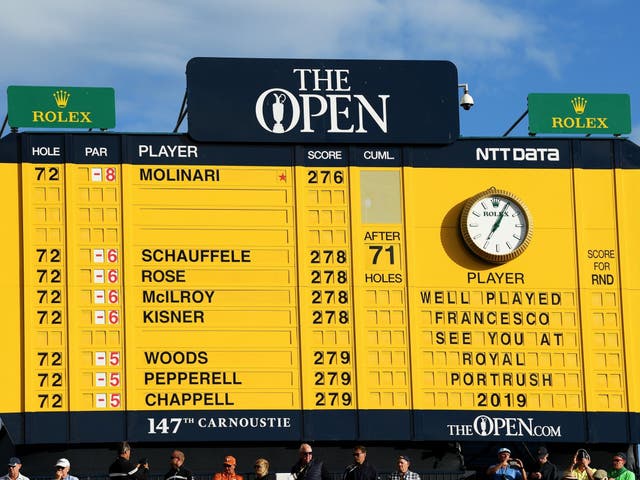 A view of the scoreboard showing the scores and congratulating Francesco Molinari