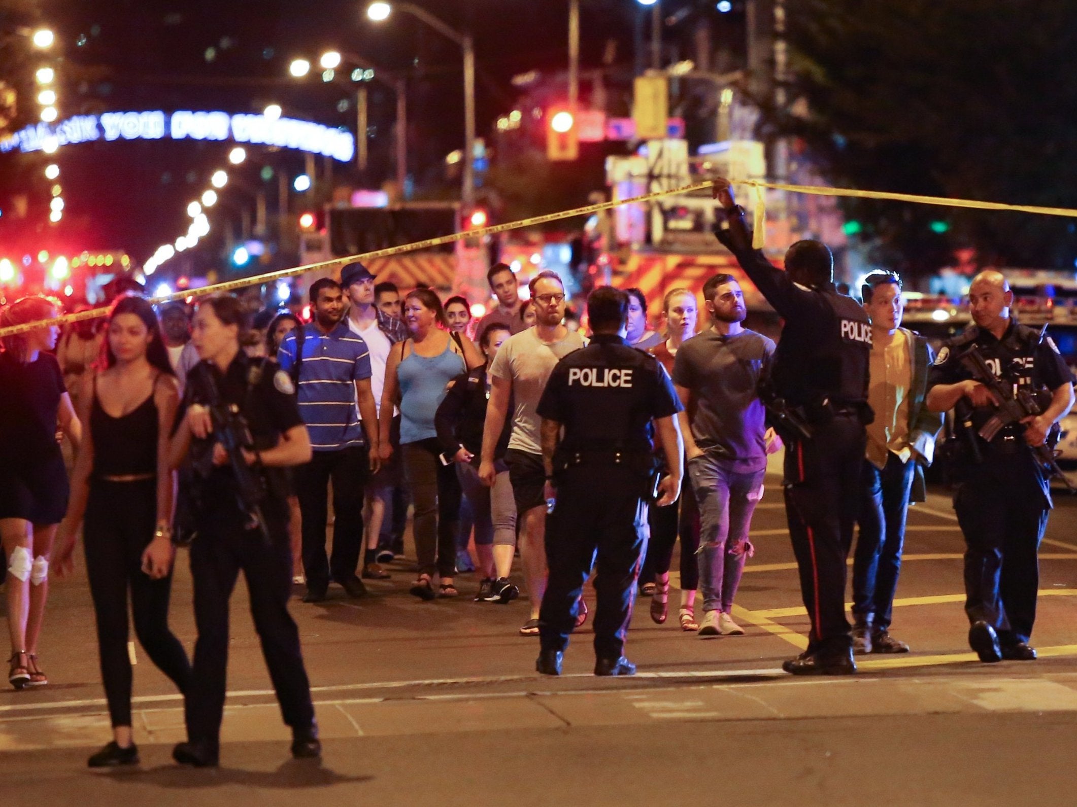 Police taped off the scene near the mass shooting in Toronto