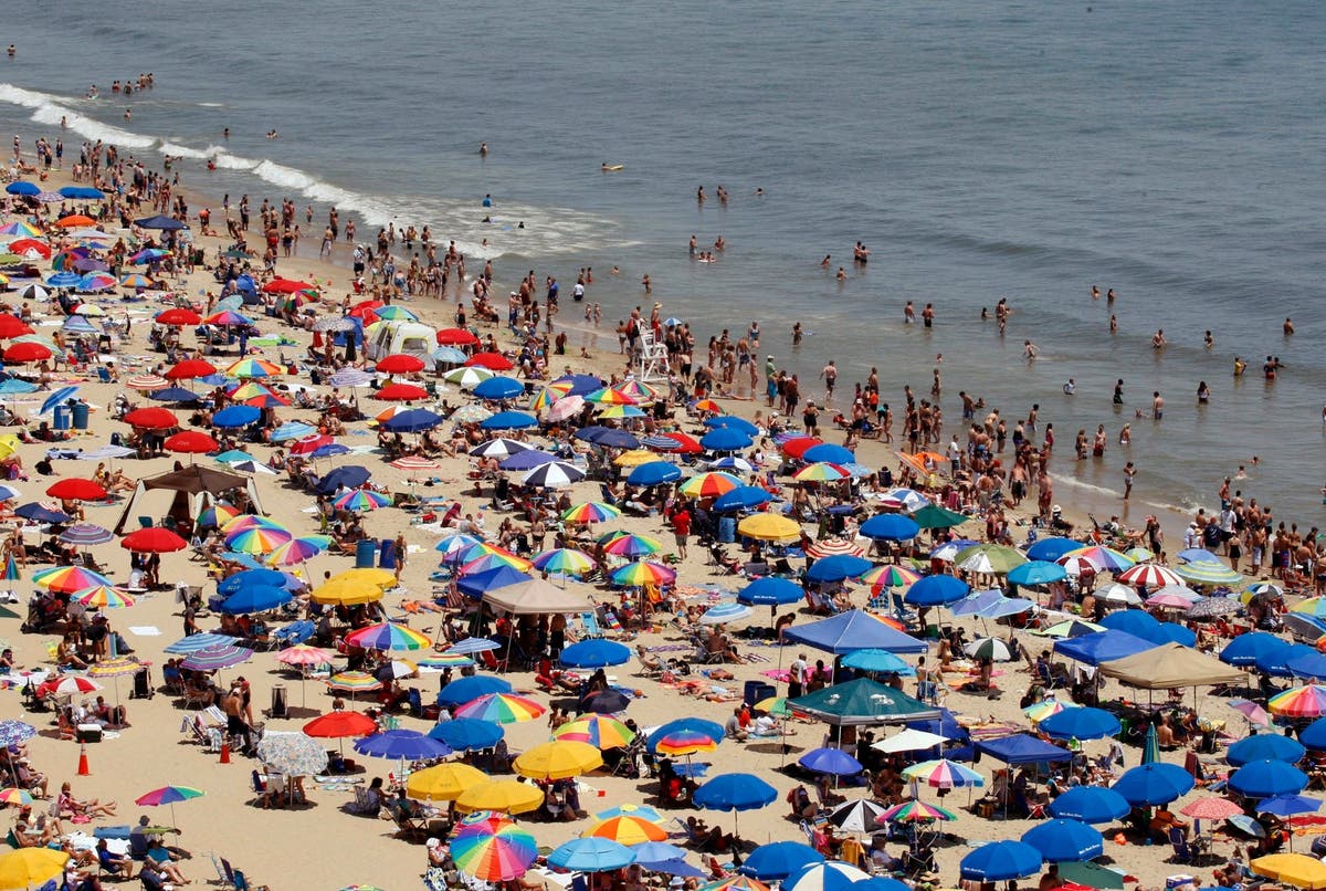 Beach umbrella impales woman in chest leading to helicopter evacuation ...