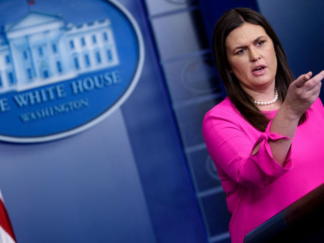 White House Press Secretary Sarah Huckabee Sanders says President Donald Trump may revoke security clearance from a host of former Obama officials and former FBI Director James Comey, in particular