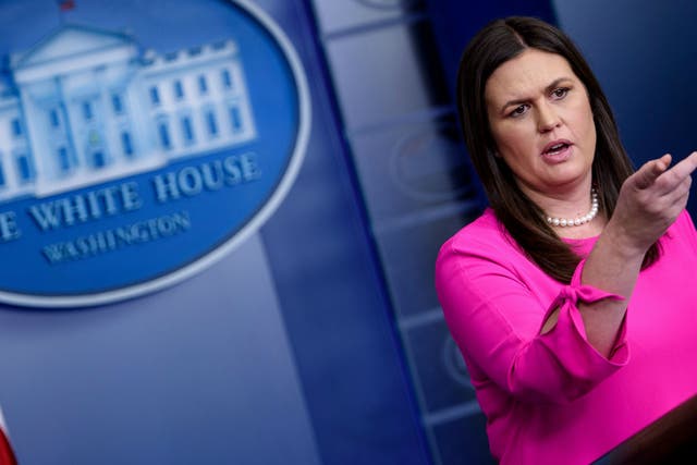 White House Press Secretary Sarah Huckabee Sanders says President Donald Trump may revoke security clearance from a host of former Obama officials and former FBI Director James Comey, in particular