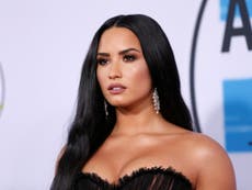 Demi Lovato awake and recovering with family after suspected overdose