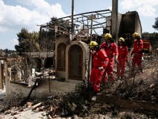 Arson suspected in Greece wildfires that killed 82 people