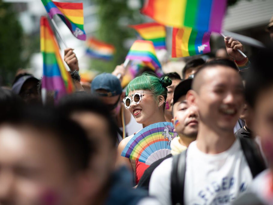 <p>File: People attend the annual Tokyo Rainbow Parade in 2018</p>