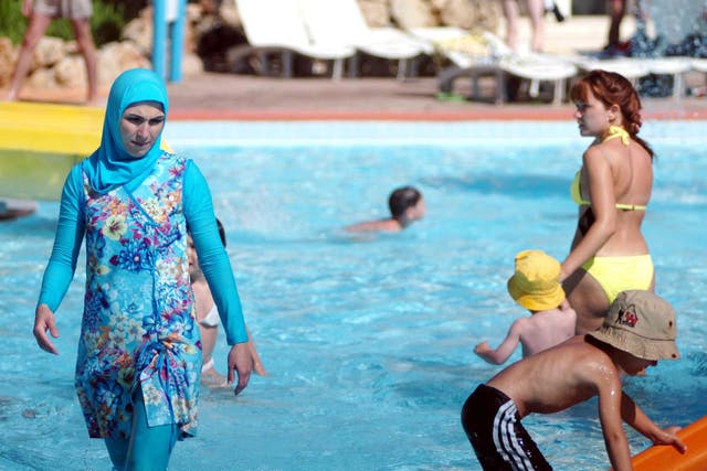 Some Muslims wear long shorts or tights, T-shirts and headscarves to go swimming