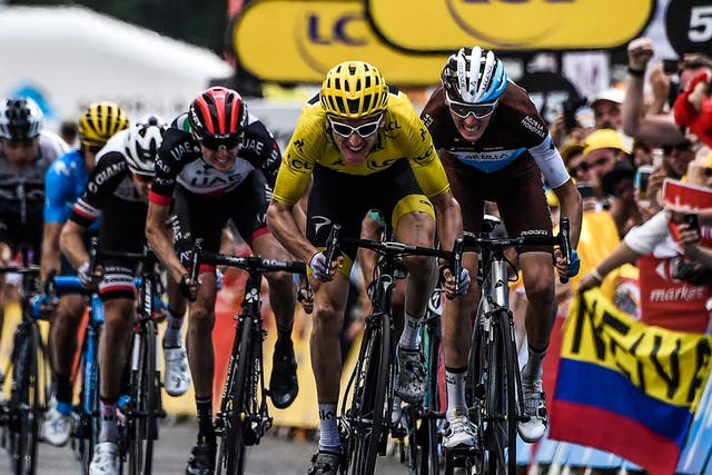 Geraint Thomas sprinted past rival Tom Dumoulin to extend his lead at the front of the Tour de France
