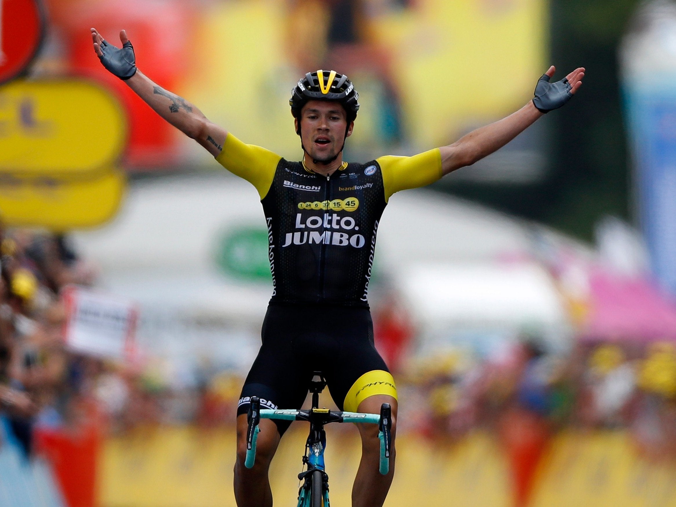 Primoz Roglic celebrates his impressive victory on stage 19 of the Tour de France