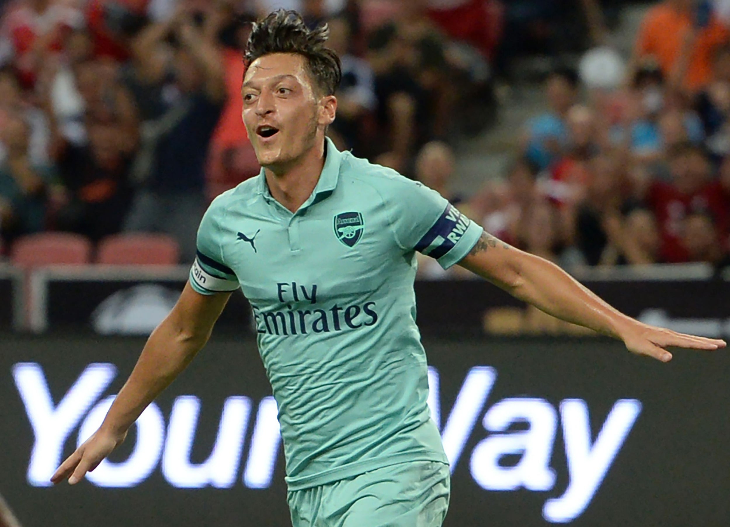 Mesut Ozil opened the scoring for Arsenal (AFP/Getty)