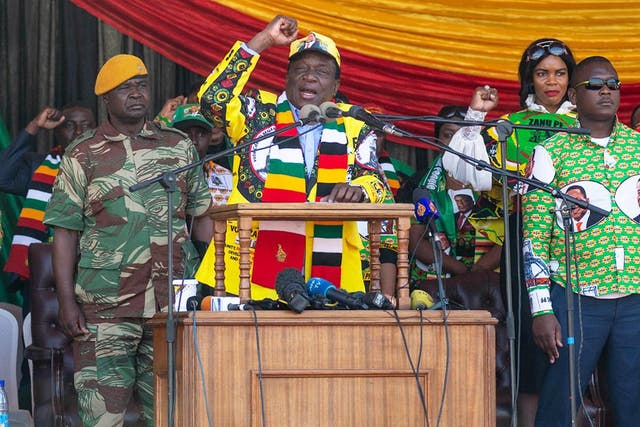 Emmerson Mnangagwa, Zimbabwe’s president and presidential candidate for the Zanu-PF party, speaks during his last campaign rally at the National Sports Stadium in Harare