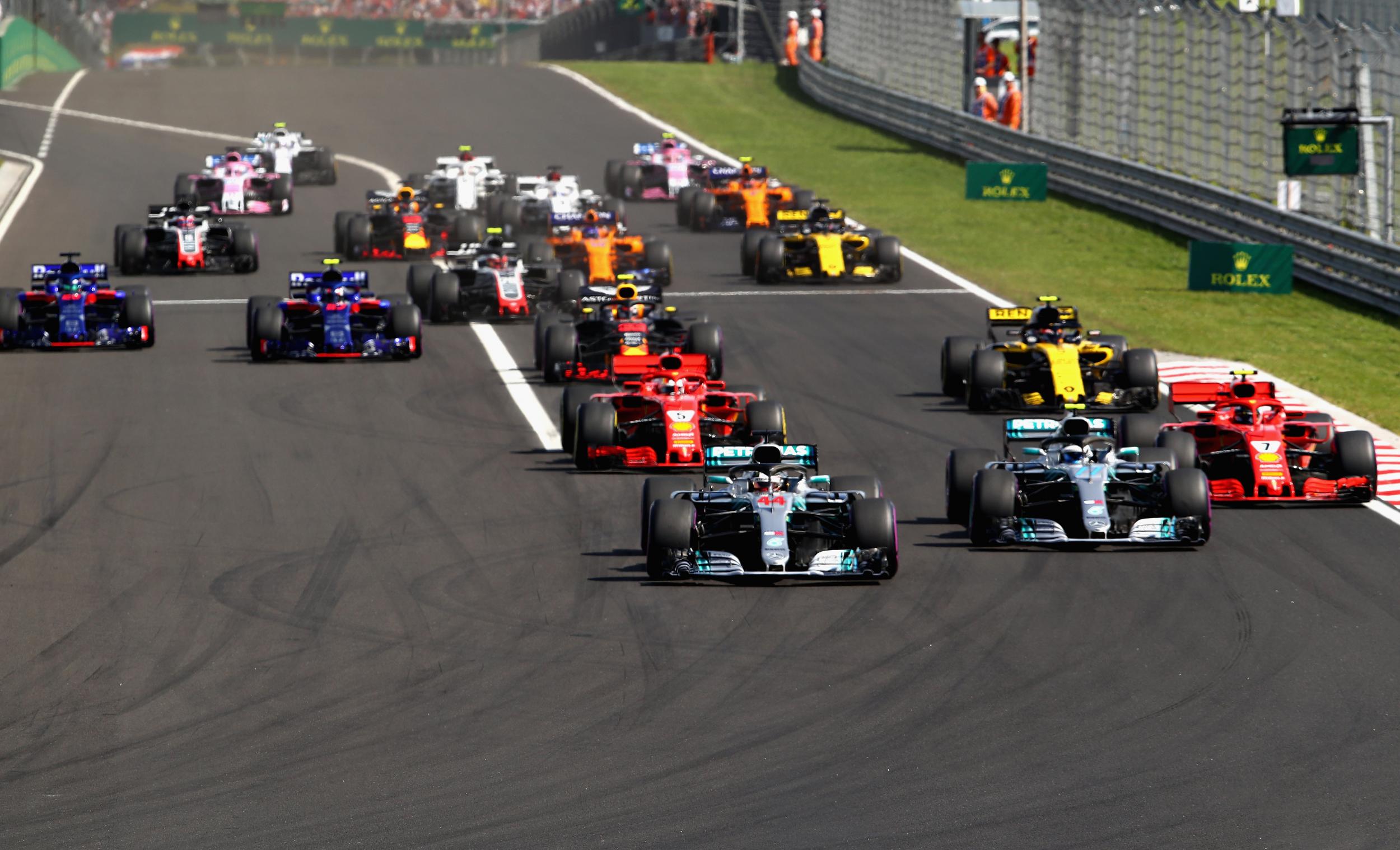 Lewis Hamilton leads the field into turn one