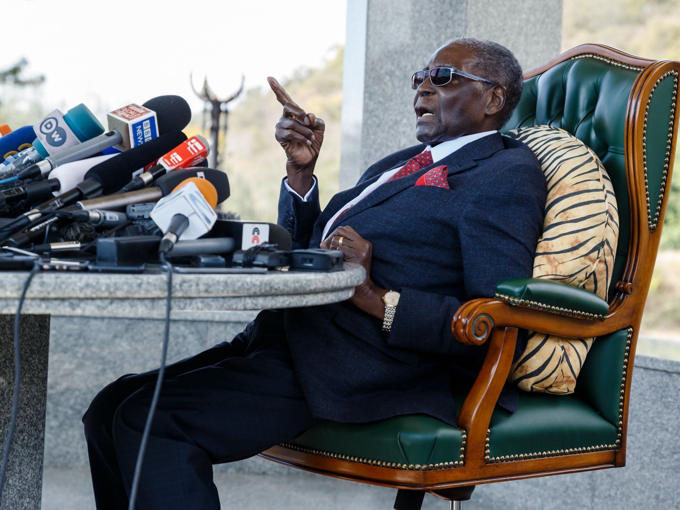 Mugabe speaks during a press conference held at his ‘Blue Roof’ residence in Harare