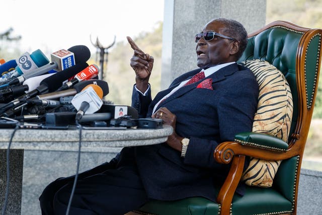 Mugabe speaks during a press conference held at his ‘Blue Roof’ residence in Harare
