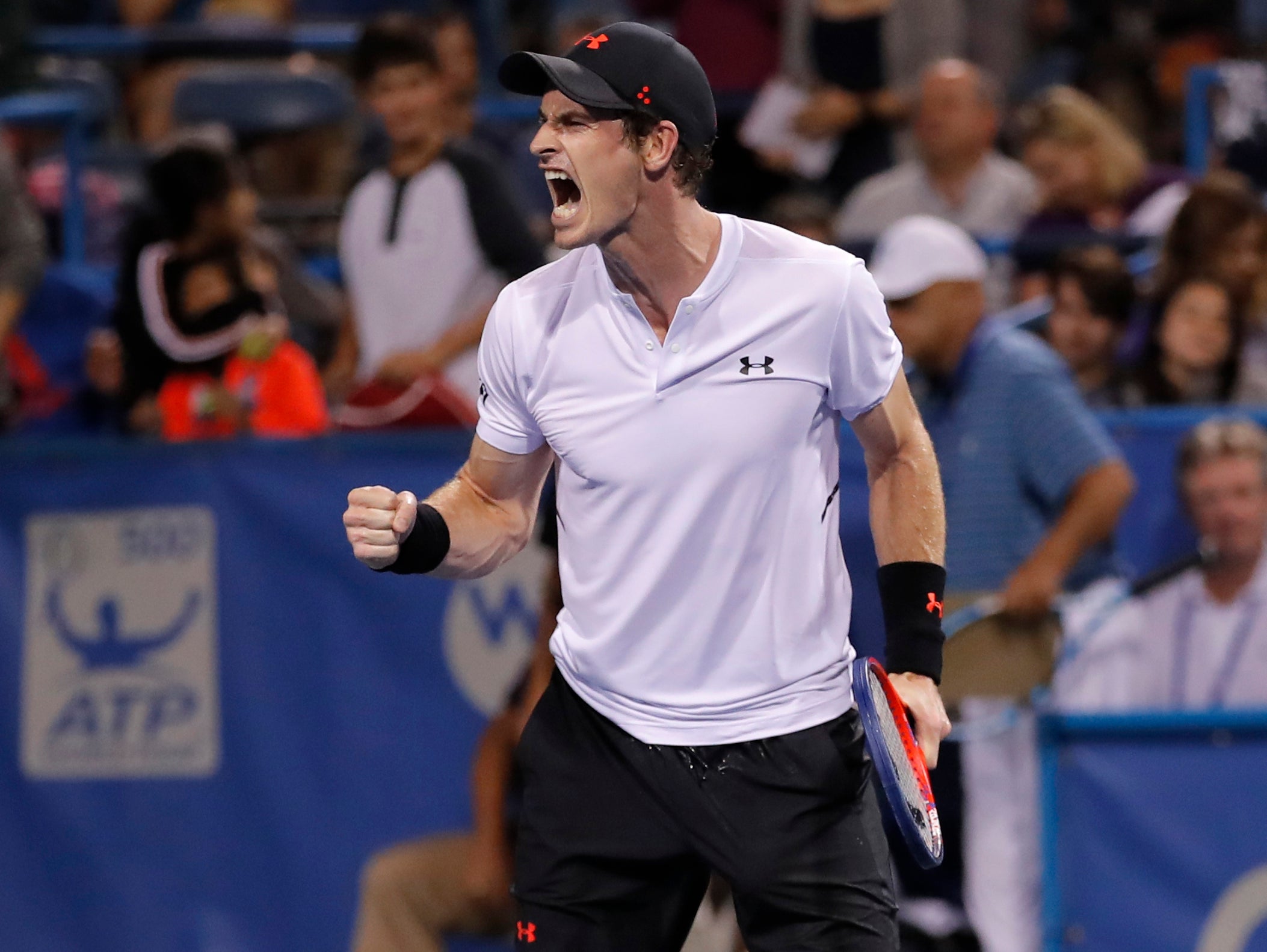 Andy Murray roars with delight after clinching victory by taking the third set 7-5.