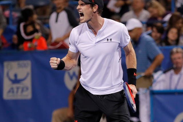 Andy Murray roars with delight after clinching victory by taking the third set 7-5.
