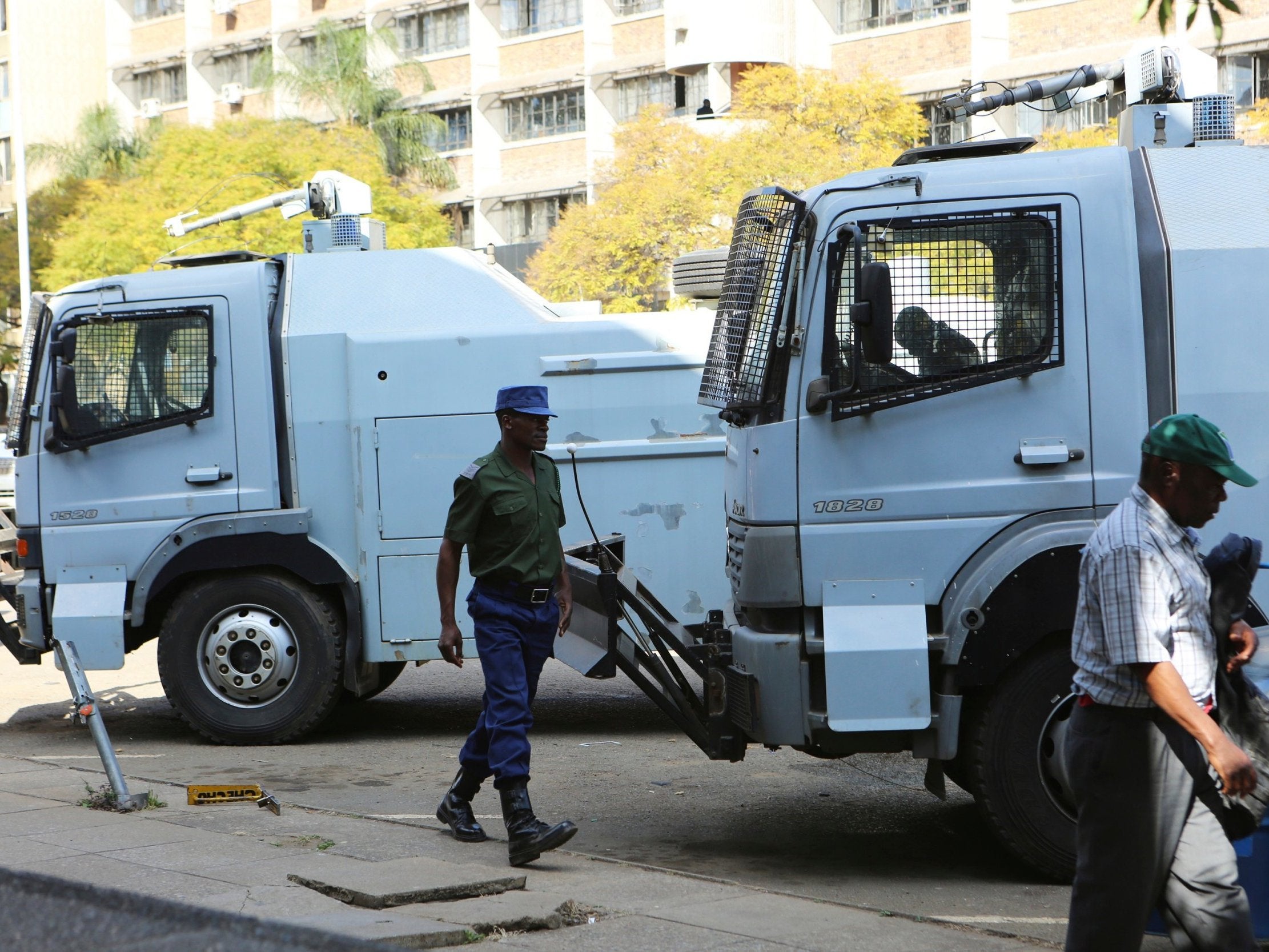 Police water cannons are seen in the capital, Harare, Zimbabwe where tensions are high following the general election.