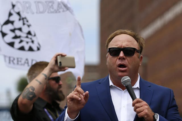 Alex Jones from Infowars.com speaks during a rally in support of Republican presidential candidate Donald Trump near the Republican National Convention in Cleveland, Ohio, U.S. July 18, 2016
