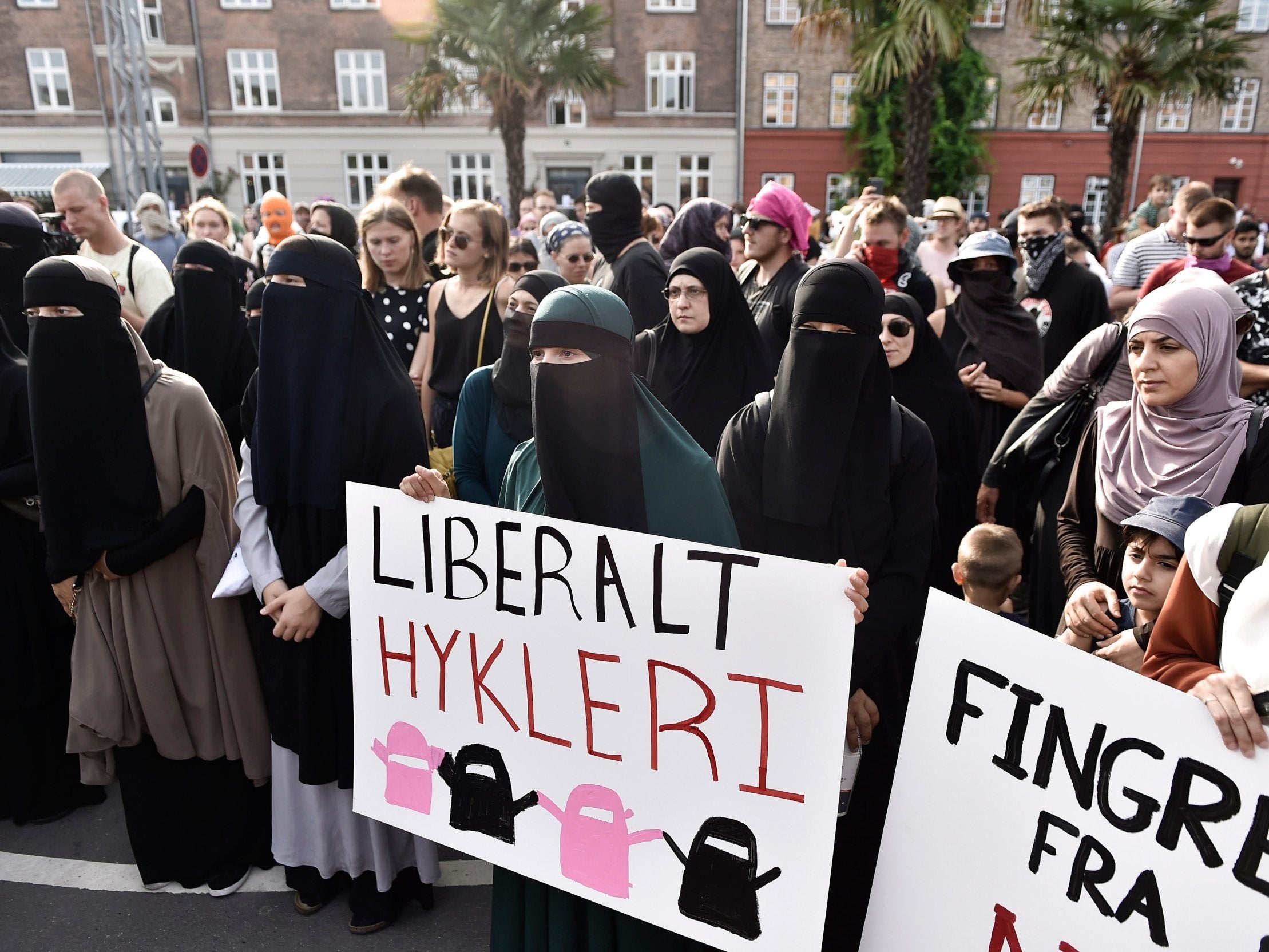 Women protest in Copenhagen on the first day of the implementation of the Danish face veil ban