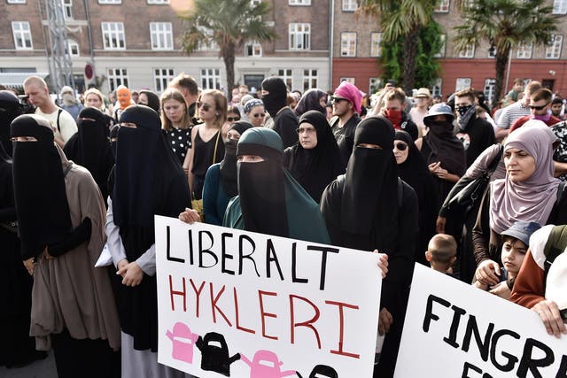 Women protest in Copenhagen on the first day of the implementation of the Danish face veil ban