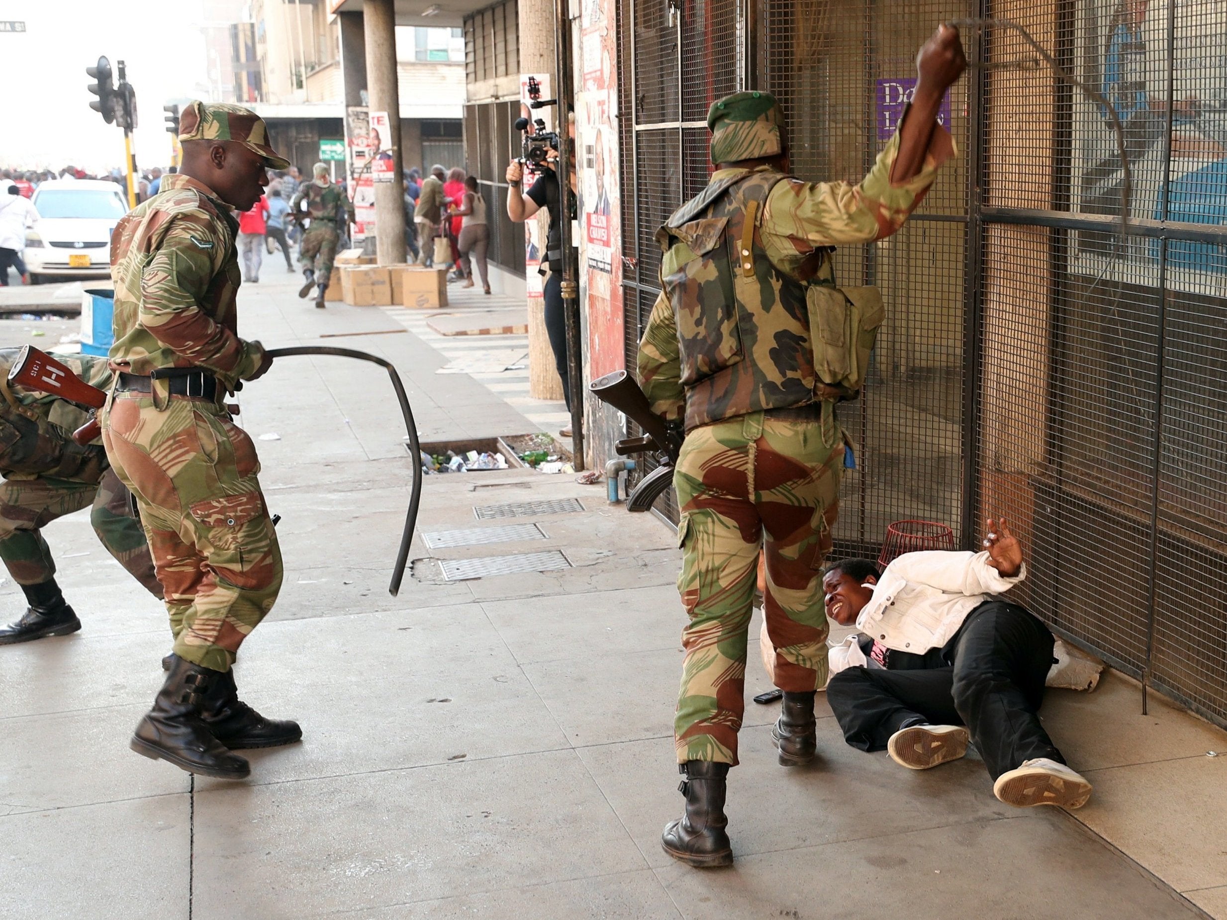 Zimbabwe elections: Violent clashes break out between security forces and opposition supporters who dispute Zanu-PF victory