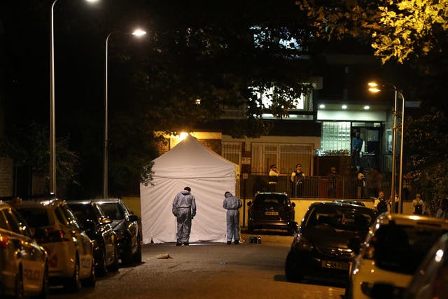 Forensic officers in Warham Street in Camberwell, south London