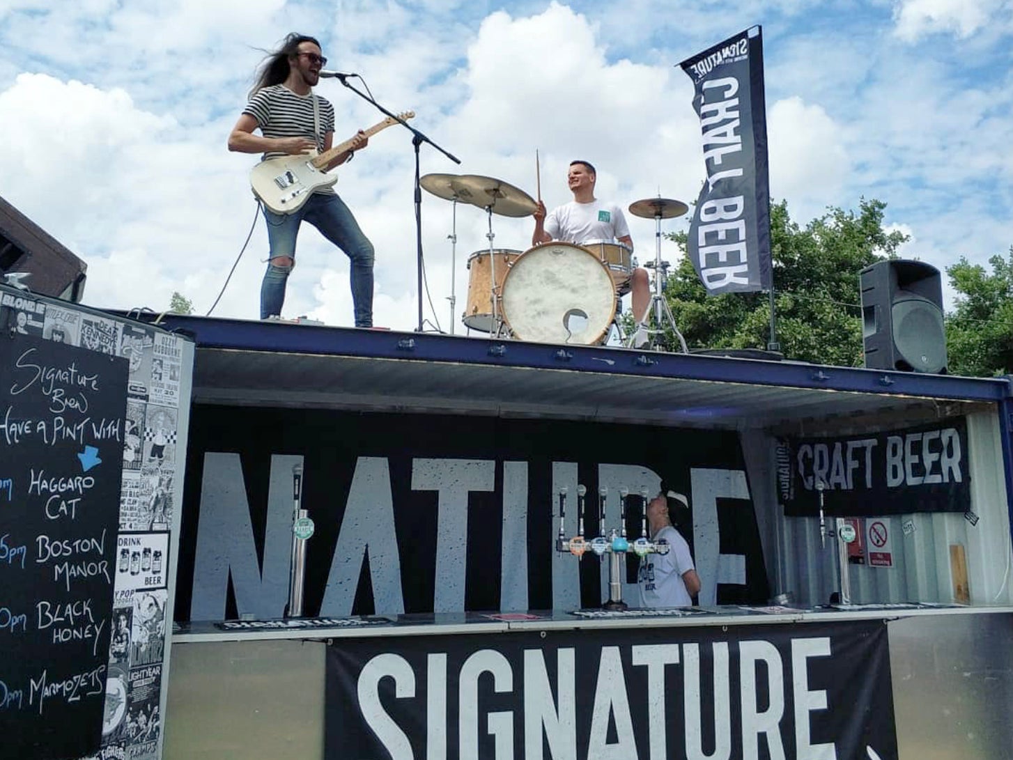 Signature Brew collaborates with bands in its mission to get craft beer into music venues: Haggard Cat play a gig atop its bar at 2000Trees festival