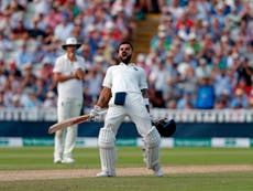 Kohli ton chisels away England's advantage after Curran's early spree