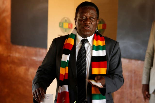 Zimbabwe's president, Emmerson Mnangagwa, casts his ballot in the general election