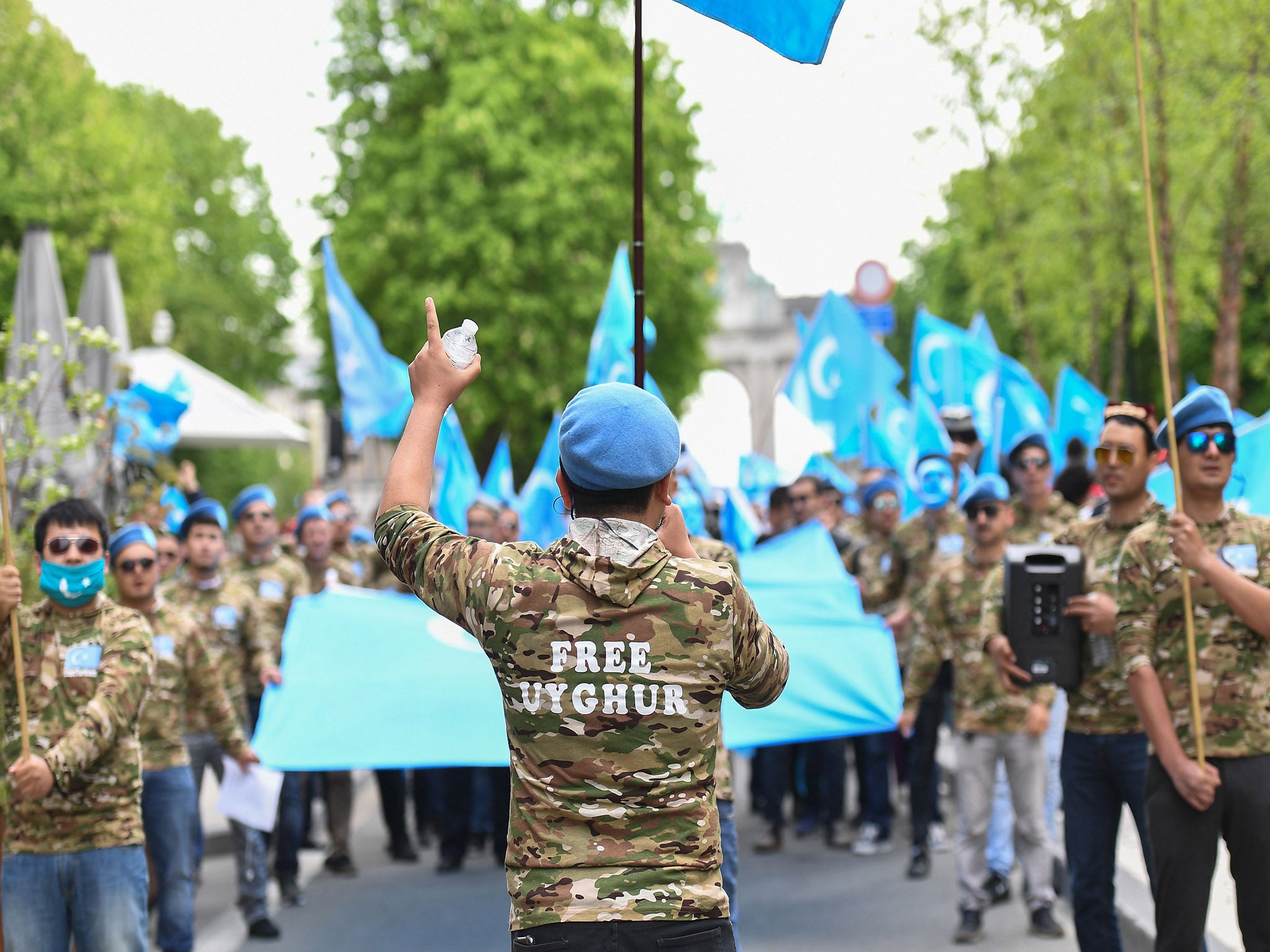 Uighur demonstrators in Brussels in April urge EU politicians to act against what they claim is a campaign to crush religious and cultural freedom in China