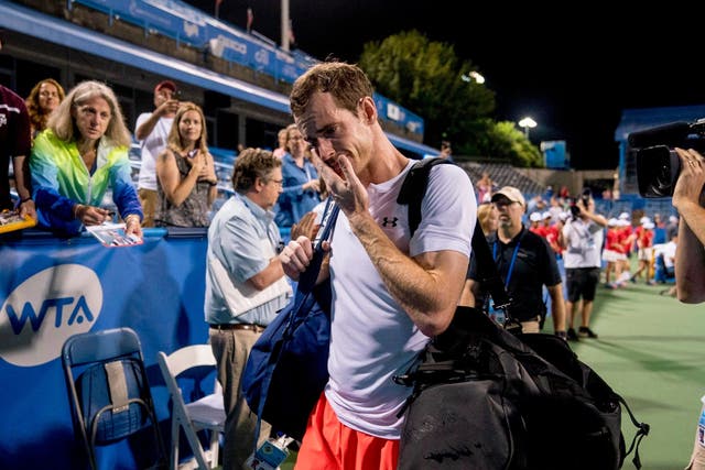 An emotional Andy Murray steps off court