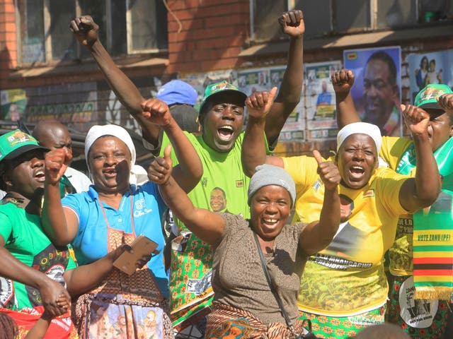 Supporters of Zimbabwe's president, Emmerson Mnangagwa, celebrate in Harare