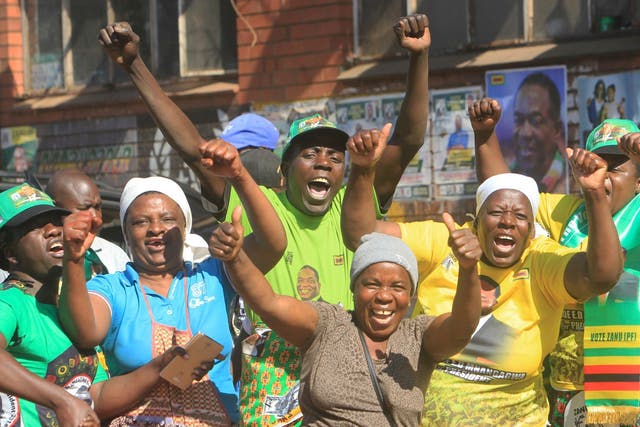 Supporters of Zimbabwe's president, Emmerson Mnangagwa, celebrate in Harare