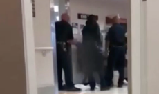 Police officer suspended after being filmed beating naked woman