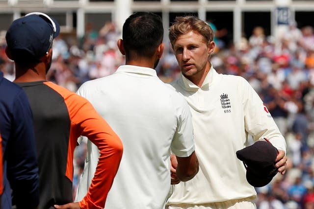England's Joe Root shakes hands with India's Virat Kohli