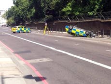 Metropolitan Police car overturns in London moped chase