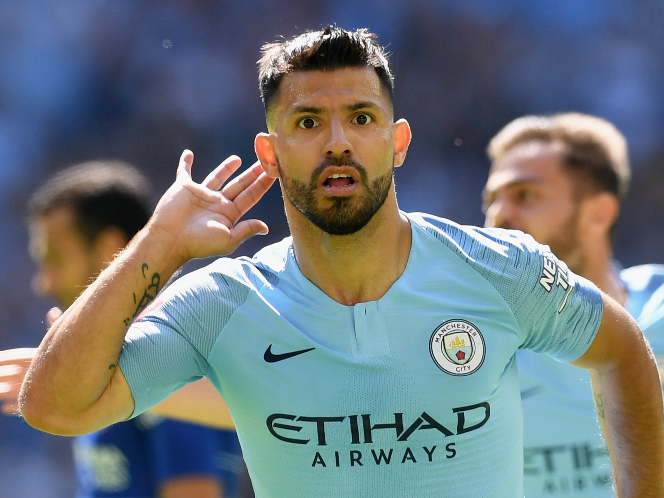 Sergio Aguero celebrates scoring the opening goal in the Community Shield against Chelsea