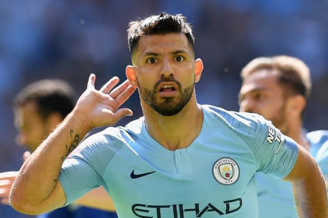 Sergio Aguero celebrates scoring the opening goal in the Community Shield against Chelsea