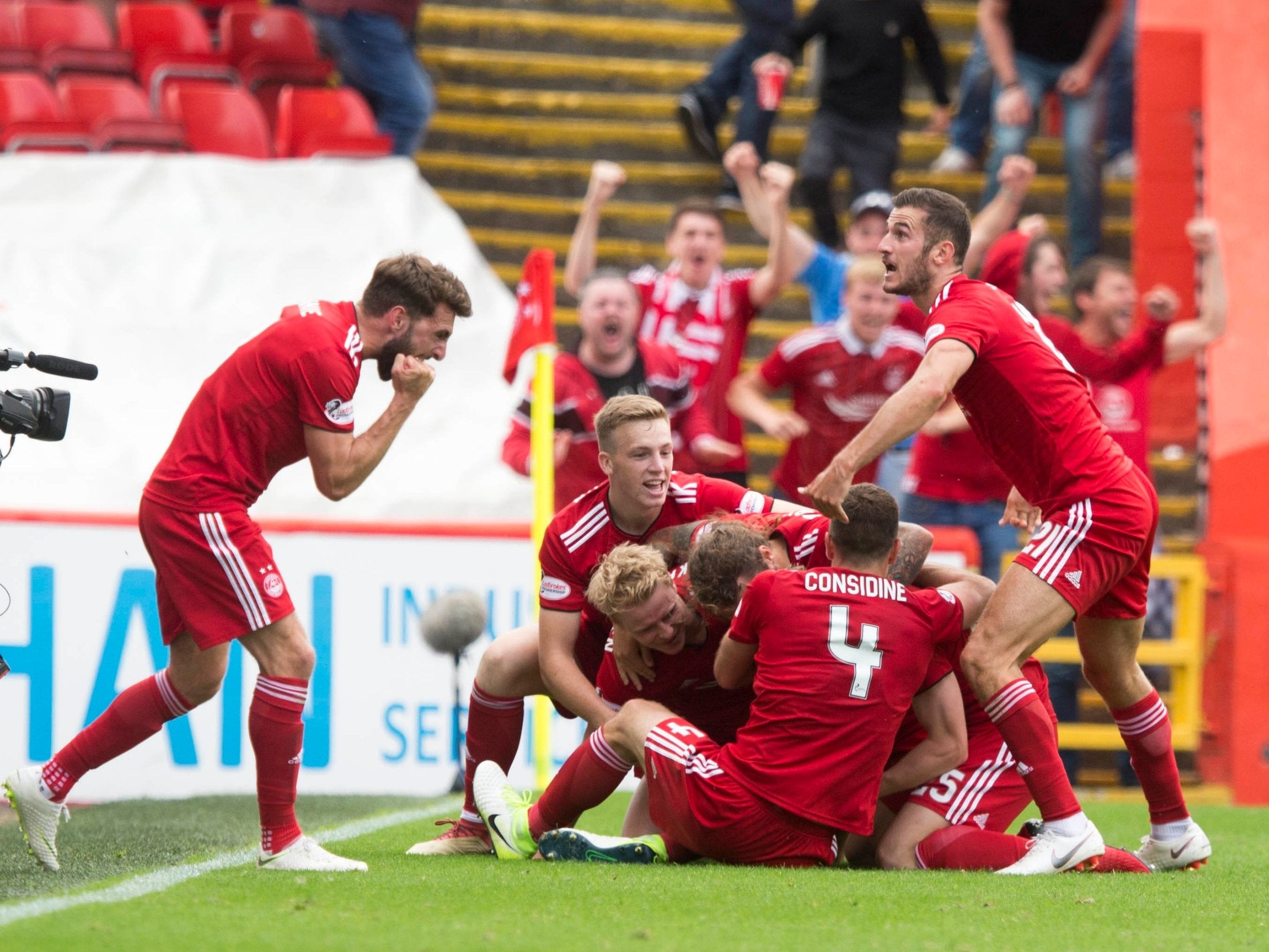 Aberdeen celebrate their equaliser at Pittodrie