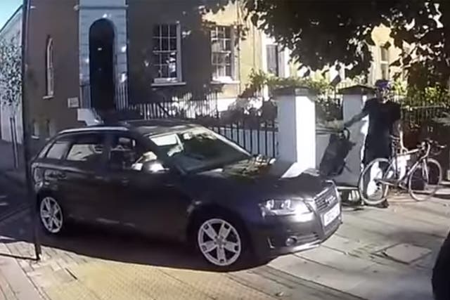 The driver is seen in the video mounting the curb and driving towards cyclists