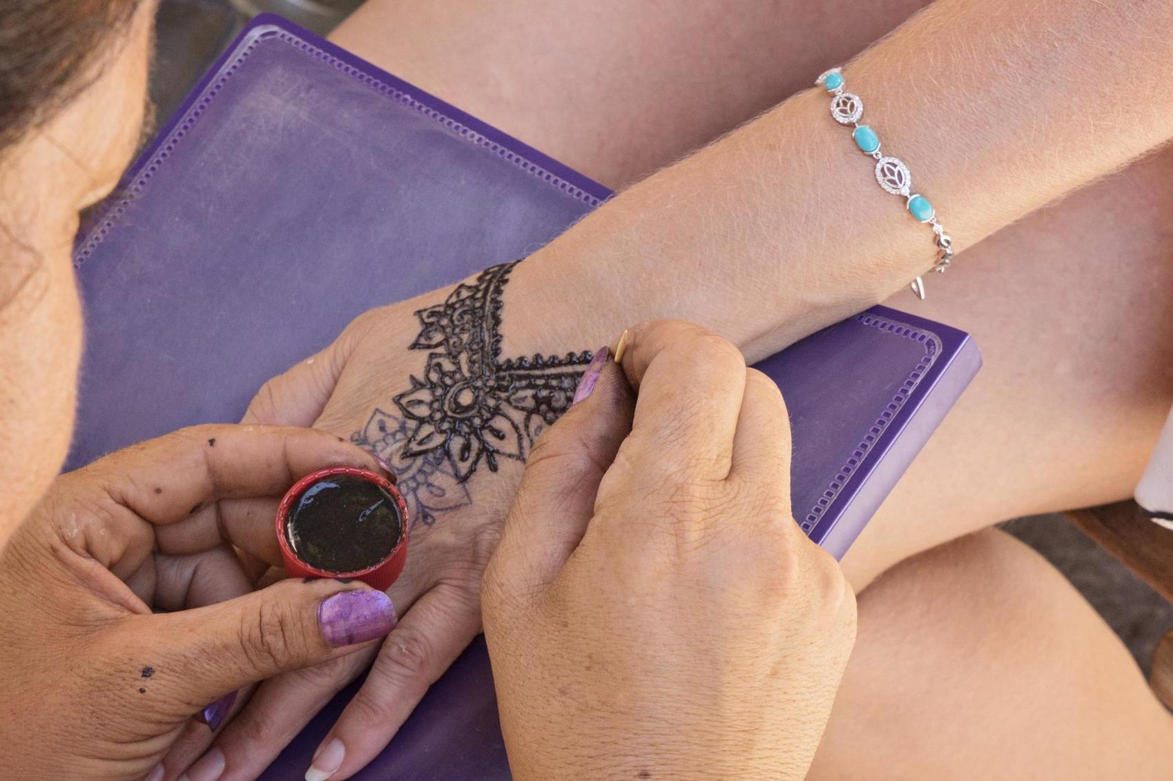 The NHS has warned that black henna could put you at risk of ‘life-threatening allergic reactions’ (Getty)