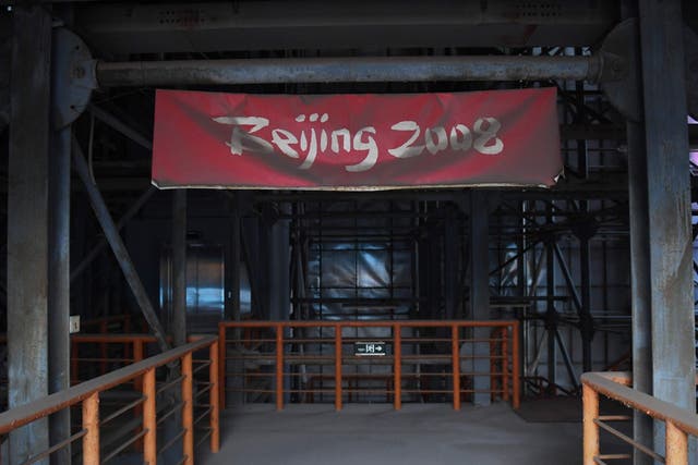 A faded Beijing 2008 sign in the grandstand of the beach volleyball stadium built for the 2008 Beijing Olympic Games