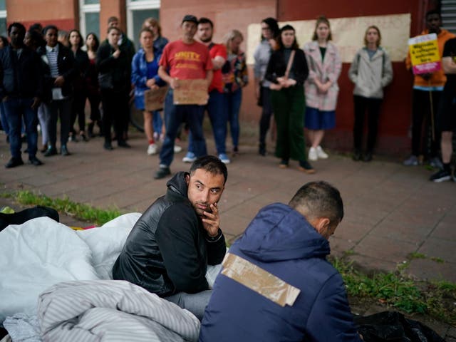 Two men who are set to be evicted, Rahman Sahah aged 32, and Mirwais Ahmadzai, 27, on hunger strike outside the Scottish Home Office on 1 August