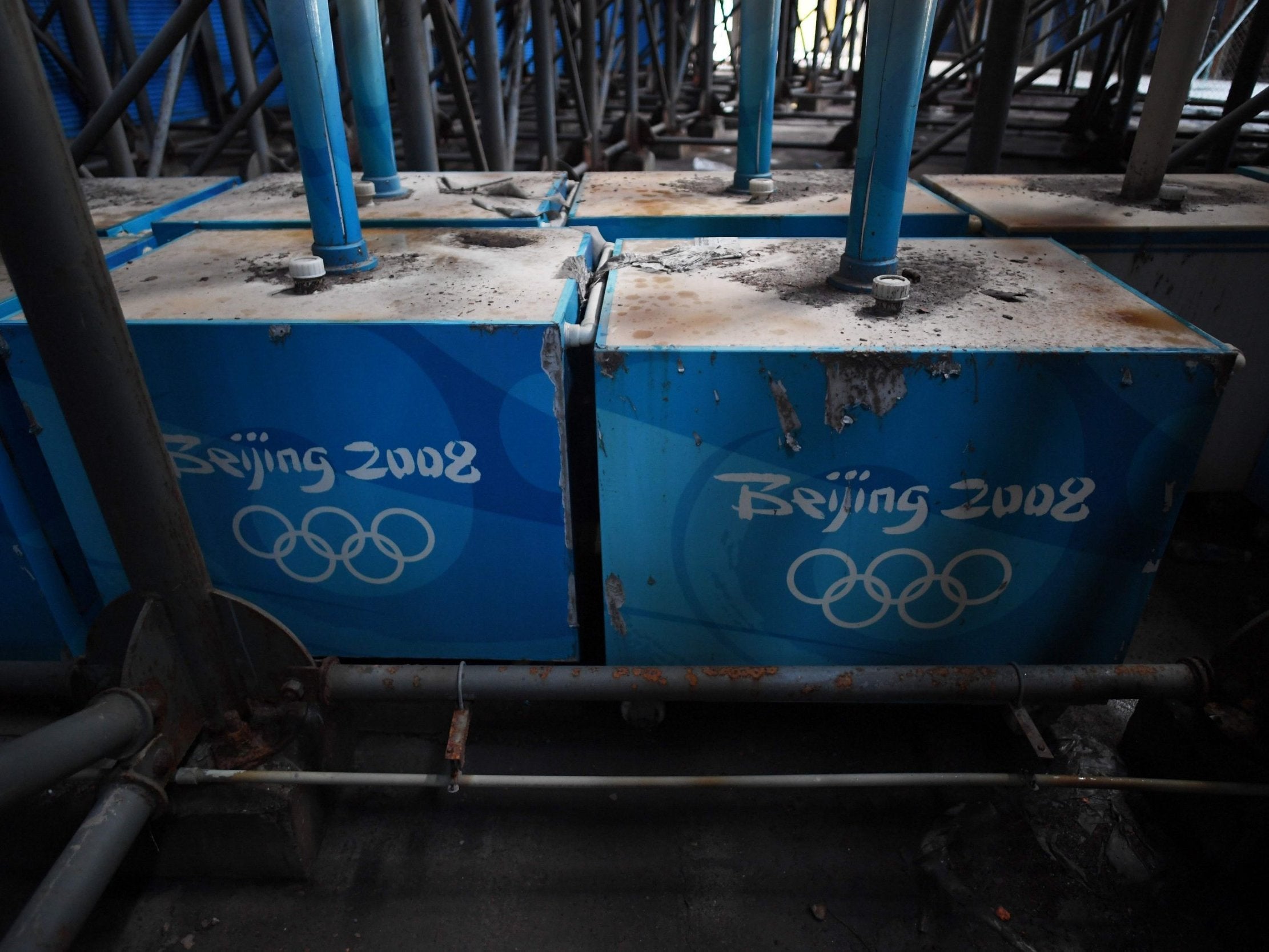 Cooling mist fans stored under the grandstand of the beach volleyball stadium