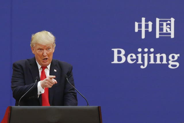 President Donald Trump speaks to business leaders at the Great Hall of the People on November 9, 2017 in Beijing, China