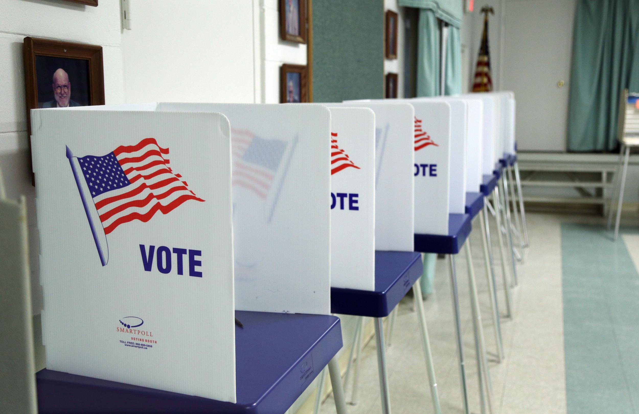 Voting booths set up and ready to receive voters inside a polling station in Christmas, Florida on November 8, 2016